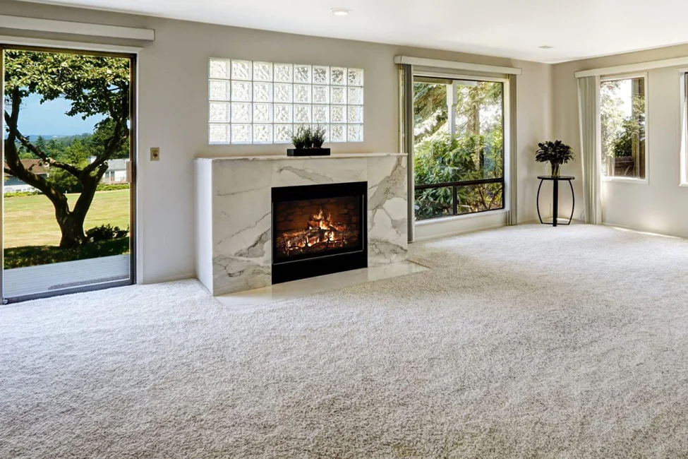 Living room with fireplace and carpet flooring